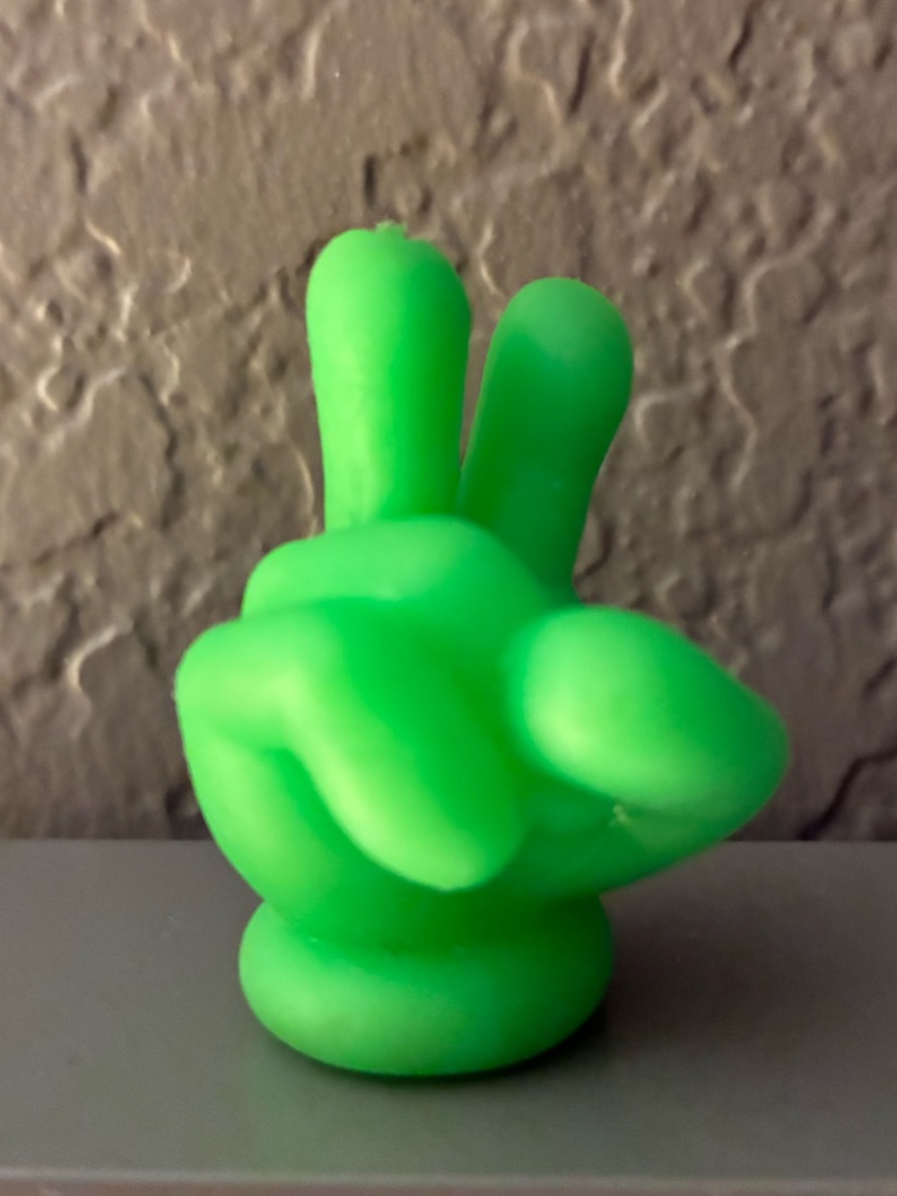 Mini individual “Teenie” NeeDoh Neon Green Peace sign Hand silicone figure. New.